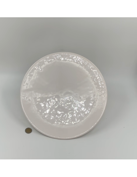 Assiette blanche usée