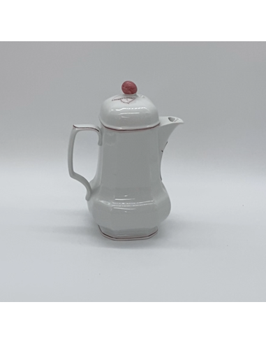 Witte porseleinen theepot