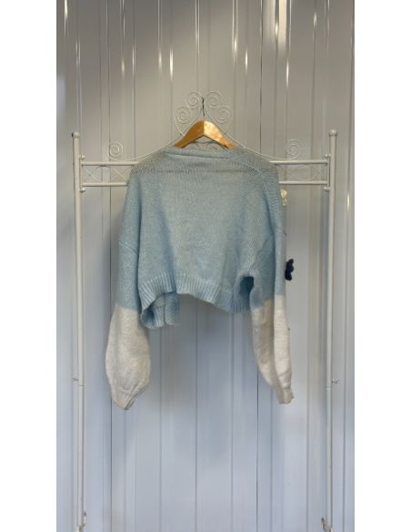 Kort gebreid vestje blauw en wit met bloemen